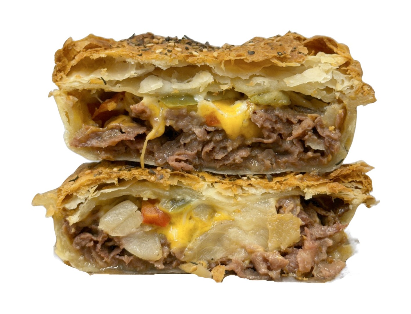 Philly Cheesesteak pie cut in half with shaved beef, peppers, onions, and melted cheese
